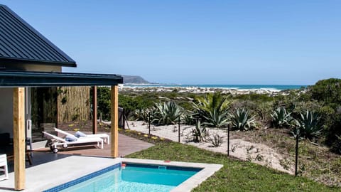 Spring, Day, Neighbourhood, Natural landscape, Bird's eye view, Garden, Garden, Balcony/Terrace, Balcony/Terrace, Beach, Beach, On site, Garden view, Garden view, Pool view, Pool view, Sea view, Sea view, Swimming pool, Swimming pool, Entertainment, Inner courtyard view