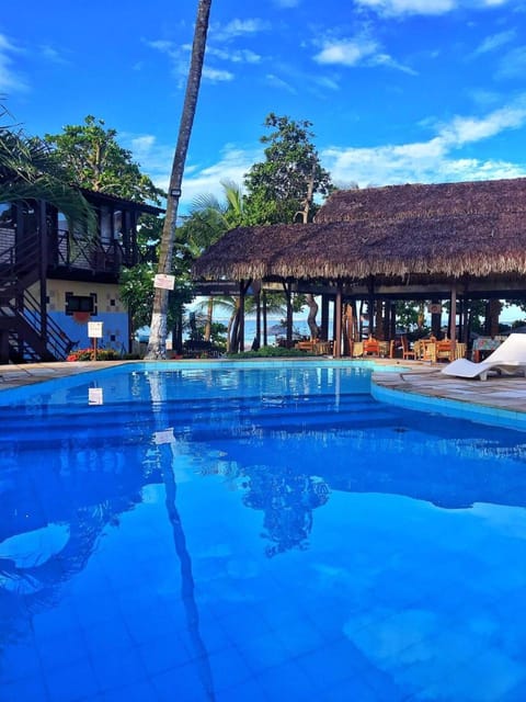 Property building, Day, Pool view, Swimming pool, sunbed