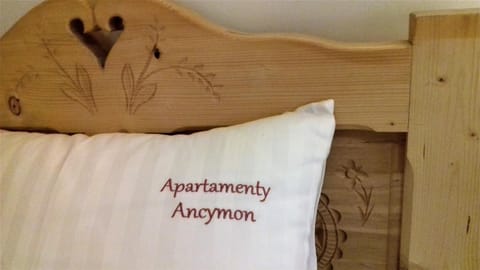 Bed, Property logo or sign, Bedroom