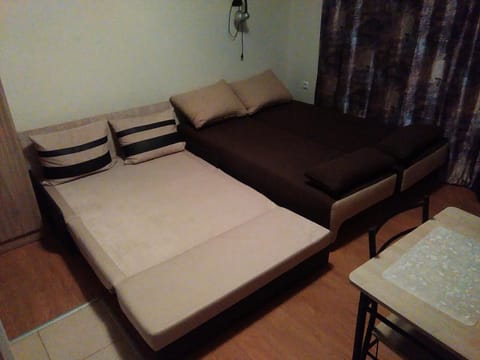 Bed, Living room, Seating area, Bedroom