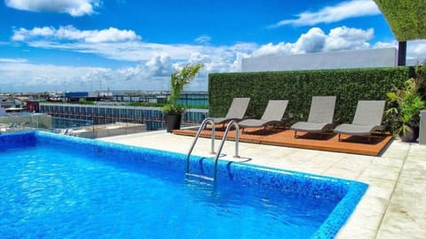 Luxury 5th Avenue Menesse 32 Condominio in Playa del Carmen
