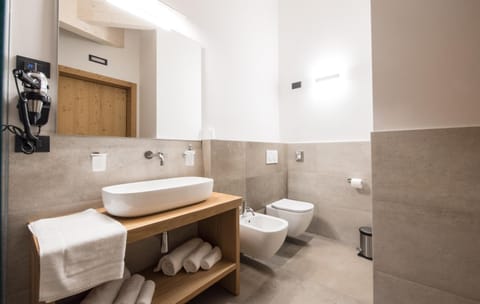 Bathroom, bidet, towels