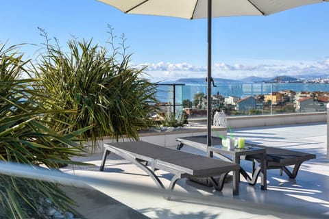 Property building, Patio, Day, Summer, View (from property/room), Balcony/Terrace, Photo of the whole room, Decorative detail, Time of day, sunbed