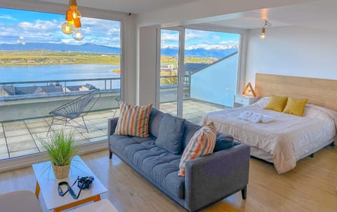 Bed, Balcony/Terrace, Living room, Seating area, Mountain view, Sea view