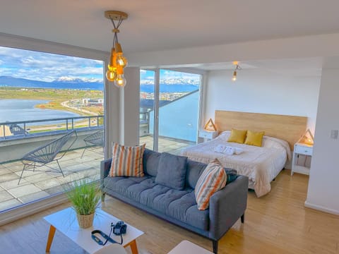 Bed, Balcony/Terrace, Living room, Seating area, Mountain view, Sea view