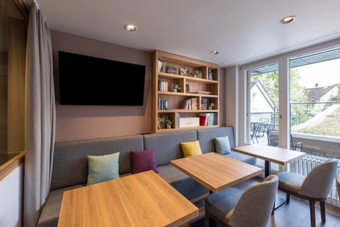 Communal lounge/ TV room, Library, Seating area