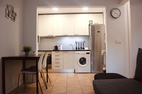 Kitchen or kitchenette, Dining area, oven, stove, washing machine