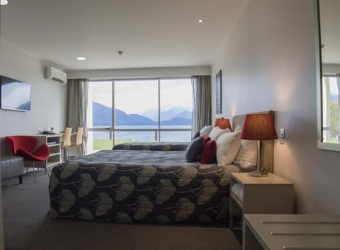 Bed, Seating area, Lake view