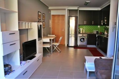 Kitchen or kitchenette, Living room, Dining area, stove, washing machine