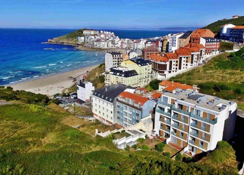 Property building, Nearby landmark, Natural landscape, Beach