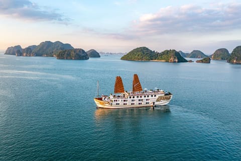 Indochina Sails Ha Long Bay Powered by ASTON Docked boat in Laos