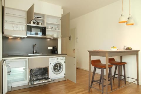 Kitchen or kitchenette, Dining area, dishwasher, washing machine, dryer