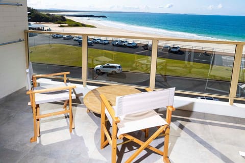 View (from property/room), Balcony/Terrace, Seating area, Beach