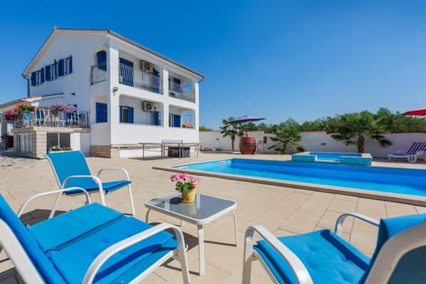 Property building, Patio, Day, Swimming pool