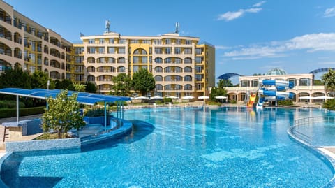 Property building, Day, Aqua park, Pool view, Swimming pool