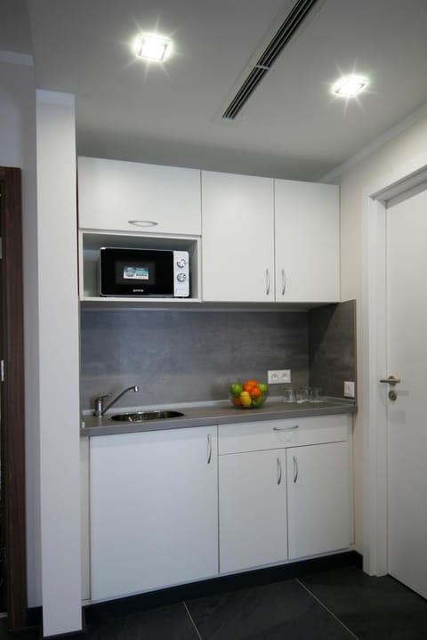 Kitchen or kitchenette, microwave