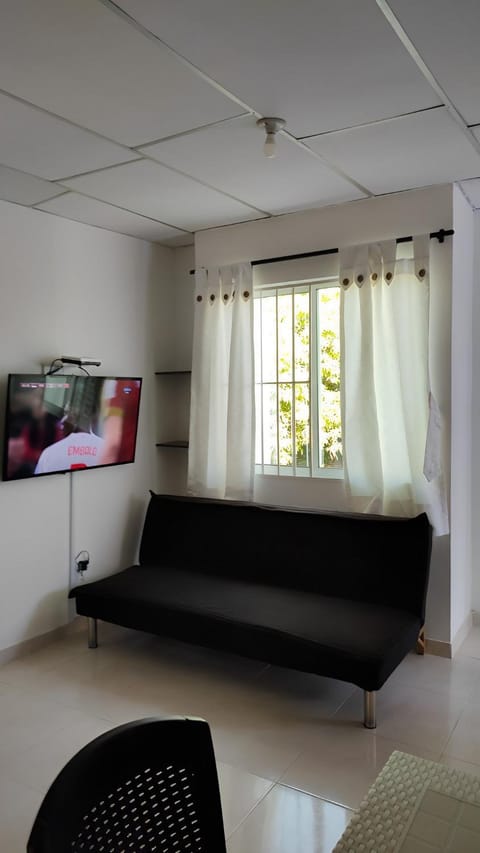 Bed, TV and multimedia, Living room, Seating area