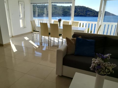 Living room, Seating area, Dining area, Sea view