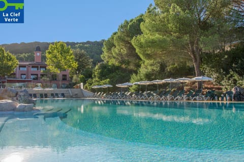 Property building, Nearby landmark, Facade/entrance, Spring, Day, Natural landscape, Summer, Mountain view, Pool view, Swimming pool, sunbed