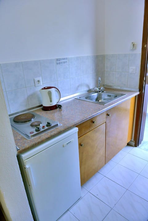 Kitchen or kitchenette, stove