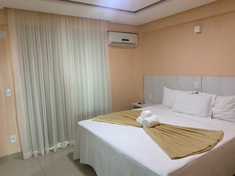 Bed, Photo of the whole room, Bedroom, towels, air conditioner