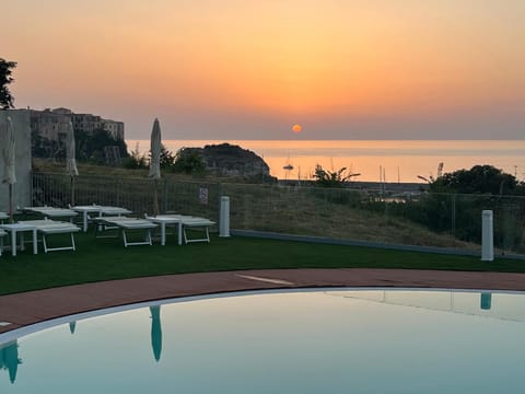 Pool view, Sea view, Swimming pool, Sunset, sunbed