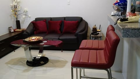 Burgundy McKinley Place Apartment in Paranaque