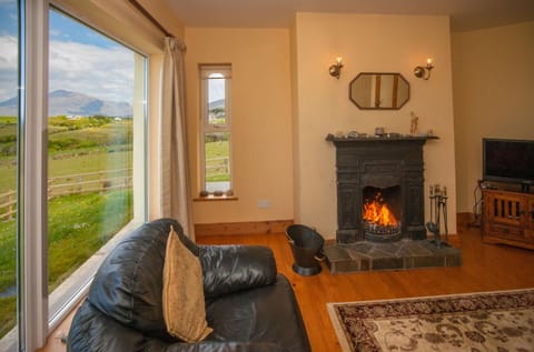 Natural landscape, Living room, Seating area, Mountain view, fireplace
