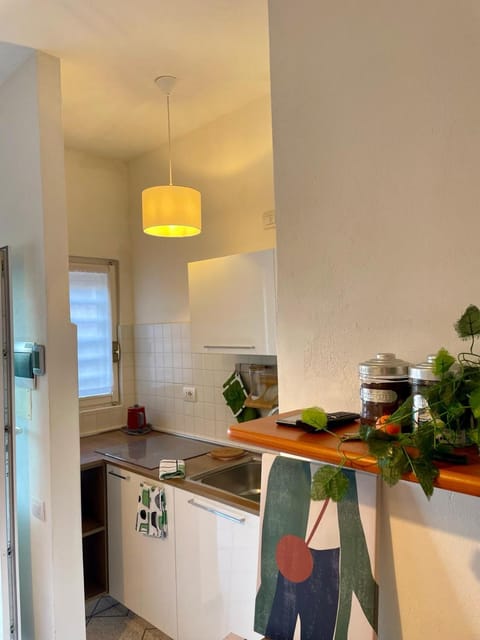 Kitchen or kitchenette, Living room, Seating area, stove