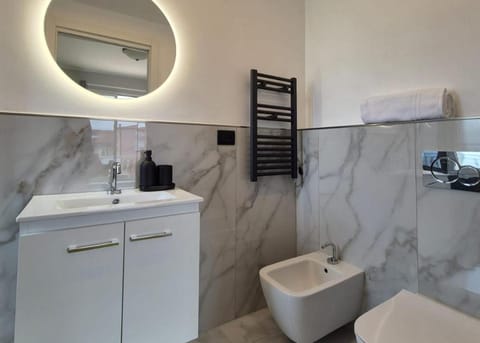 Shower, Toilet, Bathroom, hair dryier, towels