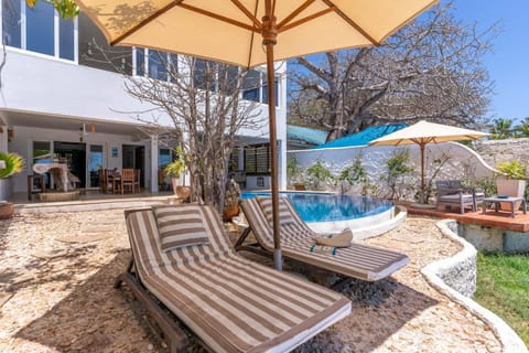 Tequila Sunrise Pool Cabana-Diani Beach Condo in Kenya