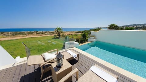 Patio, Day, Natural landscape, View (from property/room), Pool view, Sea view, Swimming pool, sunbed