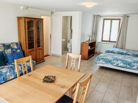 Bed, Dining area, wardrobe