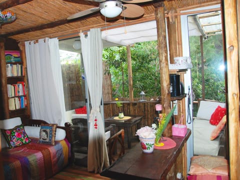 Library, Living room, Dining area, Garden view, fireplace