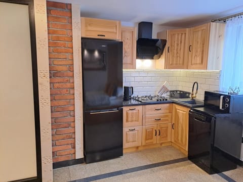 Kitchen or kitchenette, dishwasher, minibar, stove