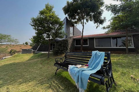 Stone House Bezze by StayVista with Lake view, Jacuzzi & Lawn - your perfect getaway Villa in Maharashtra