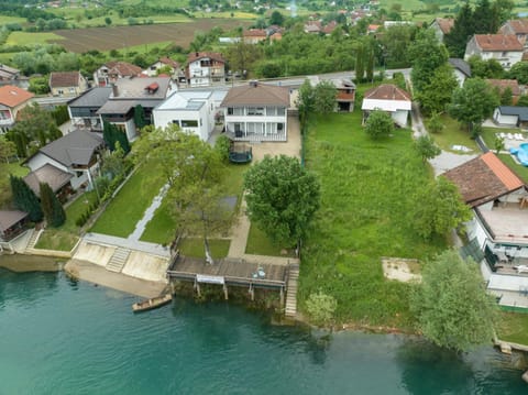 Property building, Day, Natural landscape, Bird's eye view, Lake view, River view