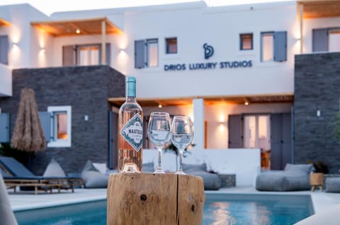 Property building, Property logo or sign, Evening entertainment, Swimming pool