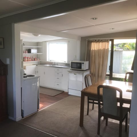 Kitchen or kitchenette, Dining area, dishwasher, stove, toaster