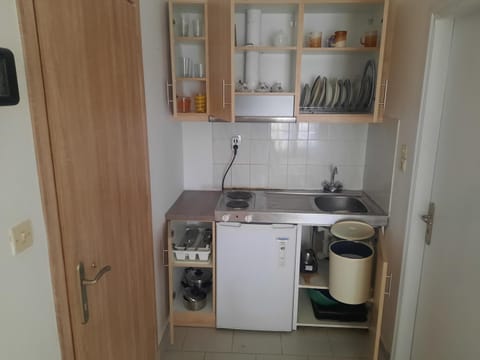 Kitchen or kitchenette, stove