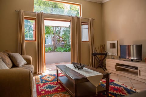 Living room, Decorative detail, Seating area, Garden view