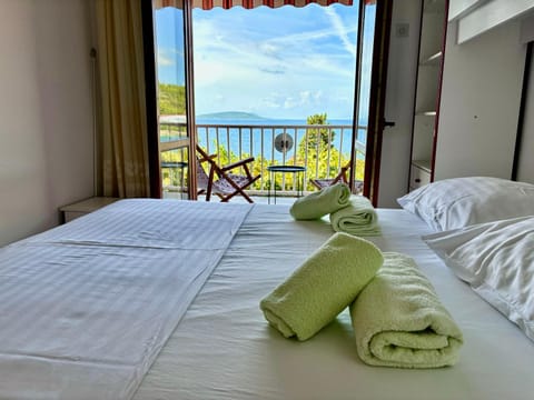 Bed, Natural landscape, Balcony/Terrace, Bedroom, Sea view