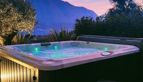 Magic Garden with Jacuzzi-Pool and Luxury Lake Como view Apartment in Lenno