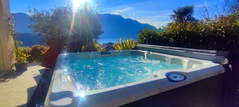 Magic Garden with Jacuzzi-Pool and Luxury Lake Como view Apartment in Lenno