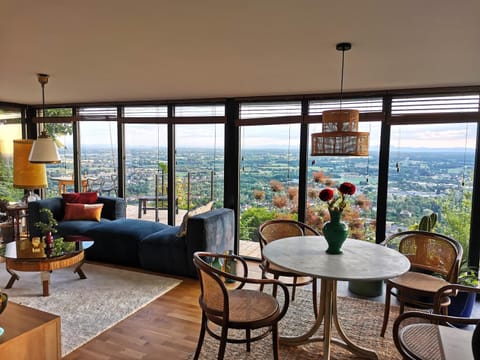 Natural landscape, View (from property/room), Living room, Seating area, Dining area, Mountain view
