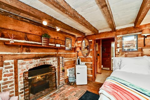 Photo of the whole room, Bedroom, fireplace