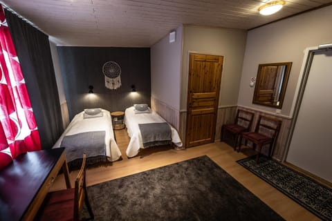 Isokenkäisten Klubi - Wilderness Lodge Hôtel in Lapland