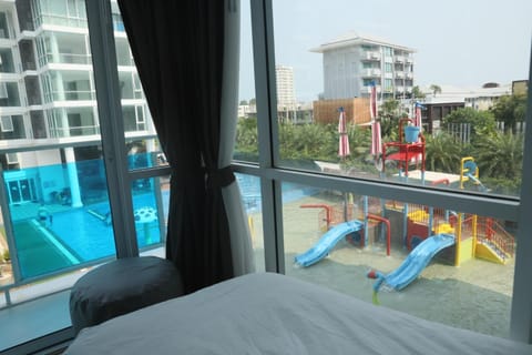 Bed, View (from property/room), Pool view, Swimming pool