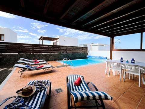 Patio, Day, Pool view, Swimming pool, sunbed