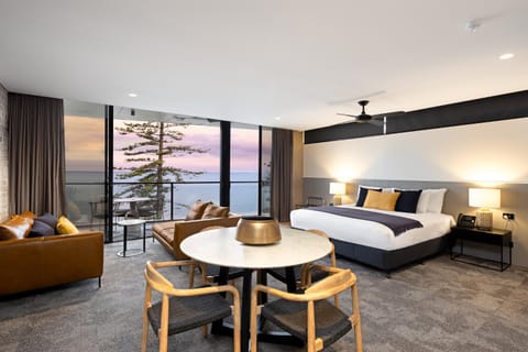 Bed, Seating area, Sea view